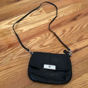 Black Coach clutch over the shoulder bag
